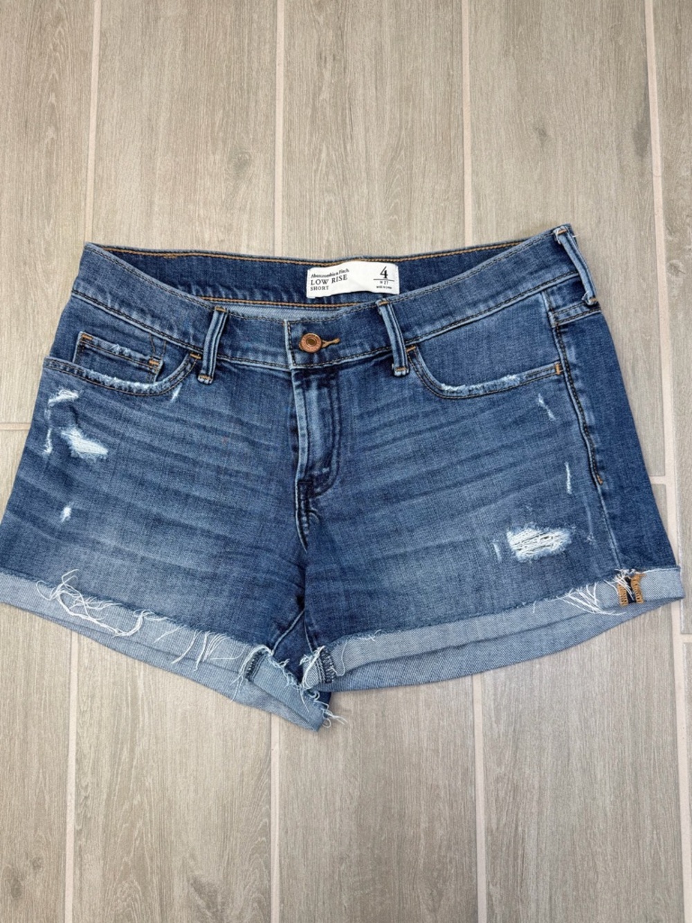 Abercrombie & Fitch Distressed Fold-Over Denim Shorts in Blue
